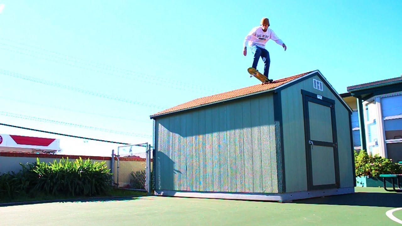 teenager-skateboarding-off-the-roof-in-nike-shoes